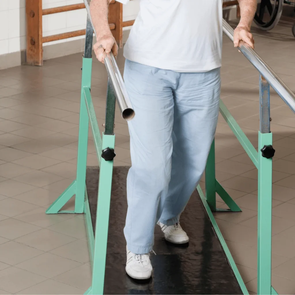 Elderly man does therapy at home with the help of a home care agency