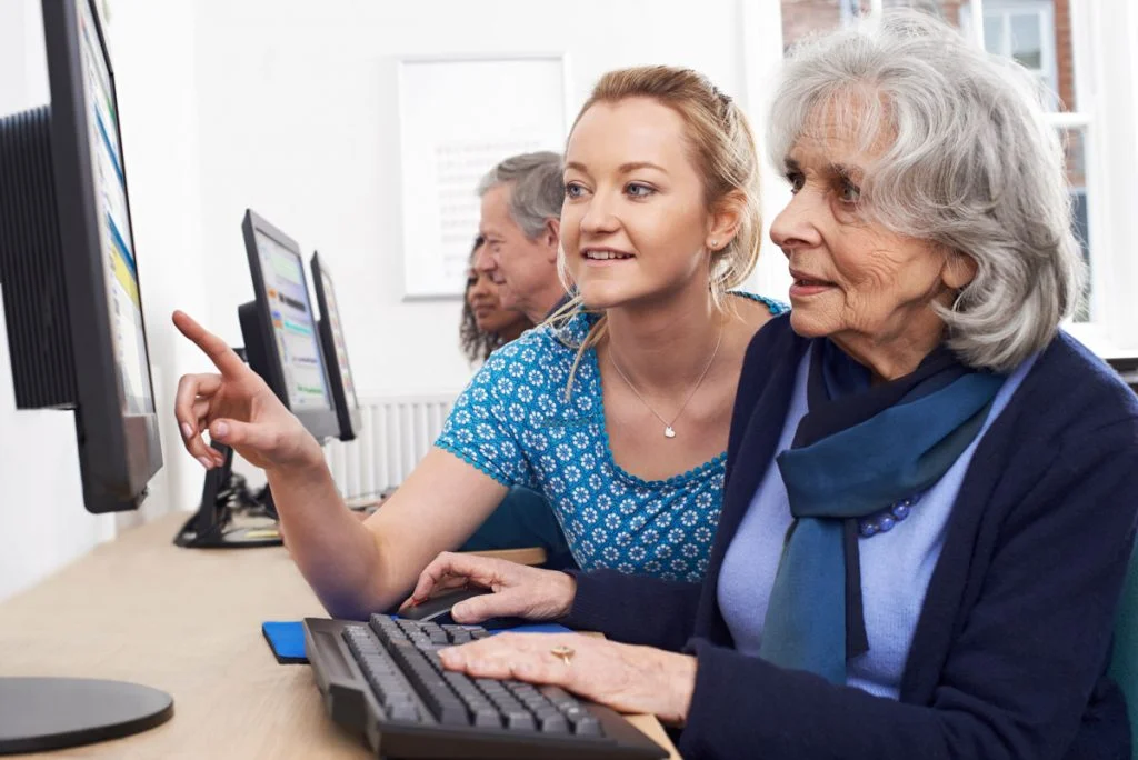 Home health worker provides geriatric care management services to a senior woman
